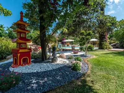 a pagoda in the middle of a garden at Holiday Home Campestra by Interhome in Coti-Chiavari