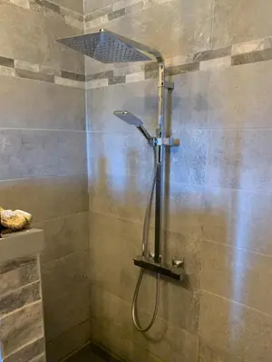 a shower with a shower head in a bathroom at À casa nostra in Santo-Pietro-di-Tenda