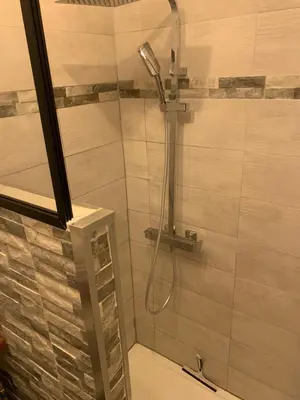 a shower with a shower head in a bathroom at À casa nostra in Santo-Pietro-di-Tenda