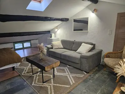 a living room with a couch and a table at A Casa Di a Vita in Rapale