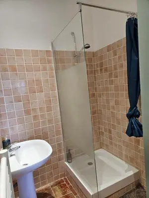 a bathroom with a shower and a sink and a toilet at A Casa Di a Vita in Rapale