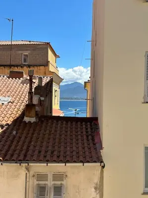 a view of the roofs of two buildings at T2 hyper centre ville in Ajaccio