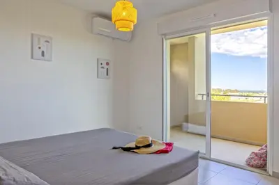 a room with a bed with a hat on it at Casa Ornella in Vescovato