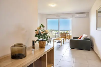 a living room with a couch and a table at Casa Ornella in Vescovato