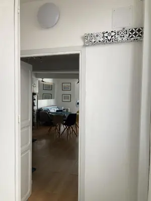 a view of a living room and a dining room at F3 hyper centre vieille ville coeur historique d'Ajaccio in Ajaccio