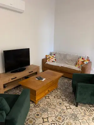 a living room with a couch and a coffee table at Villa in Piedigriggio