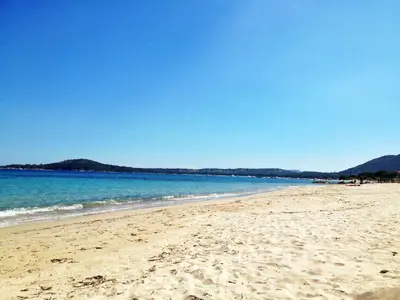 a view of a beach with the ocean at Villa Taru Pinarello in Mangialla