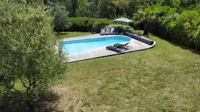 an overhead view of a swimming pool in a yard at Villa Katiris in Porto-Vecchio