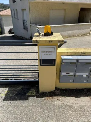 a sign sitting on top of a counter next to a street at Casa Carlu Maria III in Corte