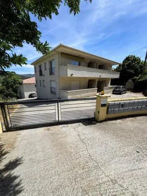a house with a fence in front of it at Casa Carlu Maria III in Corte