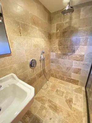 a bathroom with a shower and a sink at Les Bergeries de Pinarello, Capellina in Zonza