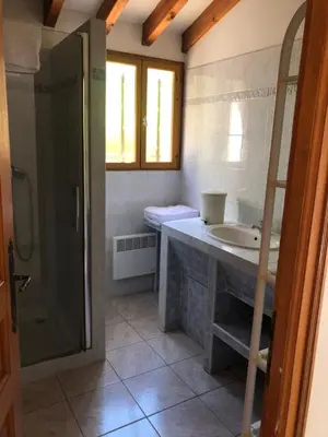 a bathroom with a sink and a shower at Villa acula in Olmeto
