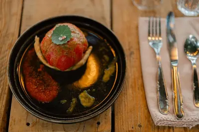 a plate of food with apples on a table at A Malgrana - Tente lodge hébergement insolite in Coti-Chiavari