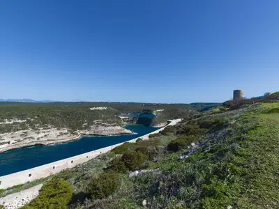 an aerial view of a river with a dam at Apartment Le Trois du Petit Sperone by Interhome in Bonifacio