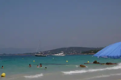 a group of people in the water at a beach at Bella Vista 42, T2 vue mer piscine Porticcio in Porticcio