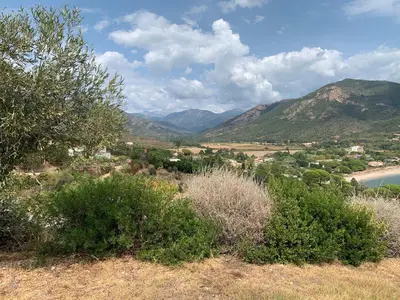 a view of a valley with a river and mountains at Chambre indépendante dans villa bord de mer in Vico
