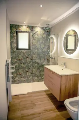 a bathroom with a sink and a shower at Le Berceau d'Asciaghju Palombaggia - Accès plage et Piscine privée in Porto-Vecchio