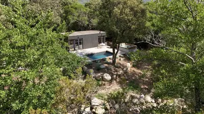 an overhead view of a house with a swimming pool at chalet Arena in Porto-Vecchio