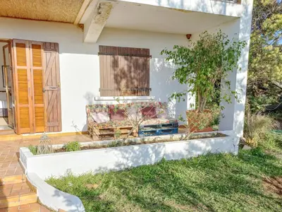 a house with a fireplace in the yard at Lemon in Casaglione