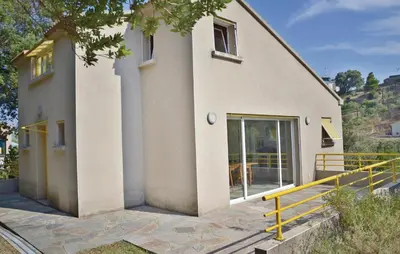 a large white house with a large glass door at Cozy Home In San Giuliano With Wifi in San-Giuliano