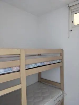 a bunk bed in a room at Vue sur mer cala Di sognu in San-Nicolao