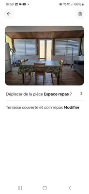 a screenshot of a webpage with a table and chairs at Rez de villa avec jardin in Porto-Vecchio