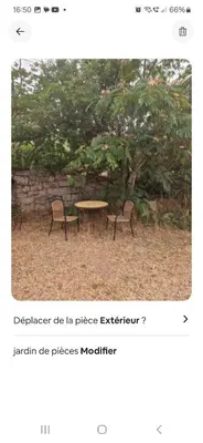 a page of a webpage with a table and two benches at Rez de villa avec jardin in Porto-Vecchio