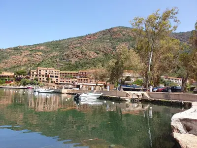 a group of boats in a body of water at Appartement Porto - Ota in Porto Ota
