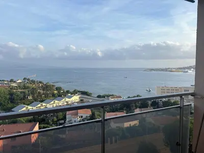 a view of the ocean from a balcony at T2 ville et bord de mer in Ajaccio