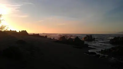 a view of the ocean at sunset from the beach at Villa vue mer 400m plages et commerces calme confort pour 6 à 8 personnes soins de remise en forme possible in Propriano