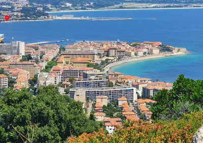a view of a city with a beach and the ocean at Jardin-Marin-Ajaccio in Ajaccio