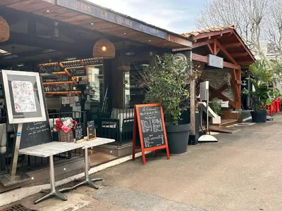 a store with a sign in front of it at Charmant 2 pièce tout équipé climatisé in Sainte-Lucie de Porto-Vecchio