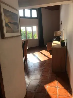 a living room with a view of a living room at Studio bord de mer in Lecci