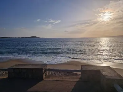 a view of the ocean on a beach at Porticcio - Agosta Plage - T2 - Chez Cath et JC in Albitreccia