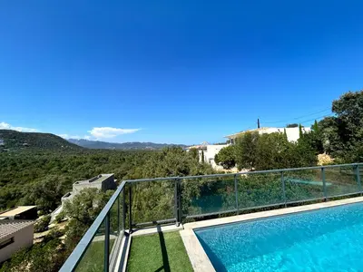 a view of a swimming pool from a house at Casacilagna in Zonza
