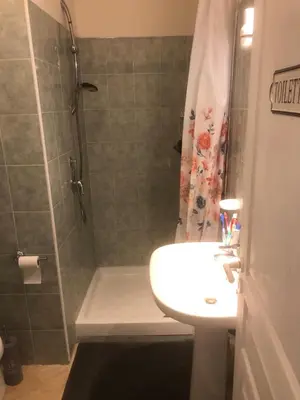 a bathroom with a shower and a sink and a shower at Bravone in Linguizzetta