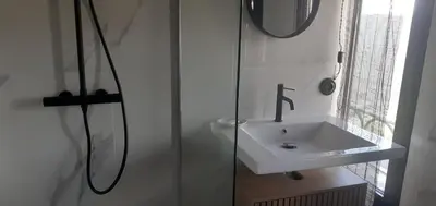 a bathroom with a sink and a mirror at A Scontra in Moïta