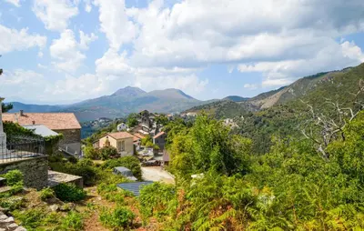 a village in the mountains with mountains in the background at Nice Apartment In Sant Andrea Di Bozio in Sant Andrea di Bozio