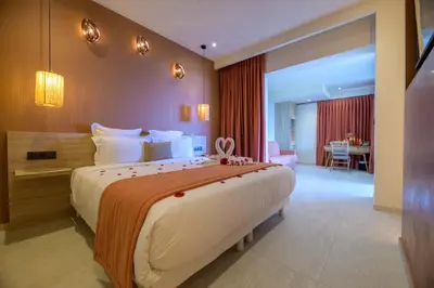 a large bedroom with a large bed in a room at Le Belvedere in Lavatoggio