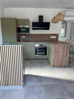 a kitchen with a wooden counter in a room at Casa Corsu Villa avec piscine in Figari