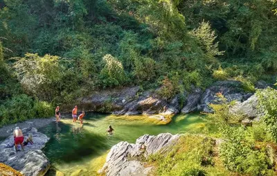 a group of people playing in a river at Lovely Home In Vignale With Wifi in Vignale