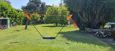 a net in the middle of a yard at La Casalamadonna in Santa-Lucia-di-Moriani