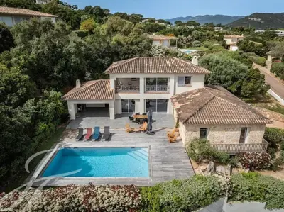 an aerial view of a house with a swimming pool at Villa ALPANNA in Cirendinu