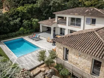 an aerial view of a house with a swimming pool at Villa ALPANNA in Cirendinu