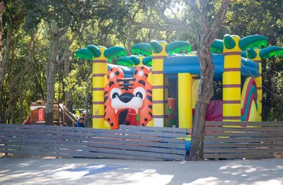 a childrens play structure in a park at Campo Di Mare in Porto-Vecchio