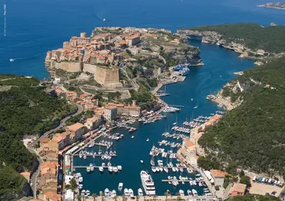 an aerial view of a harbor with boats in the water at Studio Kalliste - Vision Luxe in Bonifacio