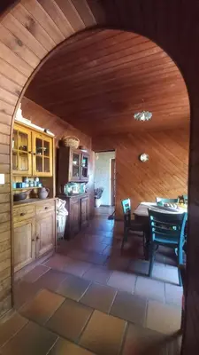 an archway in a kitchen with a table and chairs at A casa di Francesca in Marignana