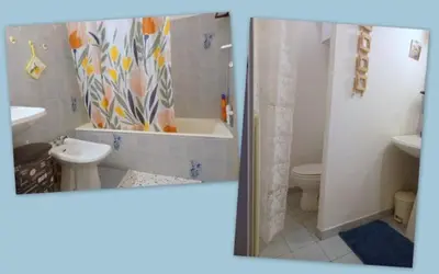 a bathroom with a tub and a sink and a toilet at t1 bis vue imprenable in Ajaccio