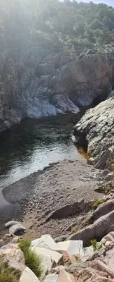 a view of a river with rocks and water at Maison du Fangu - Da Simone - Maison de 160 m2 in Galeria