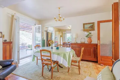 a dining room with a table and chairs at Maison du Fangu - Da Simone - Maison de 160 m2 in Galeria